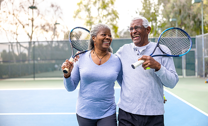 active couple on tennis court