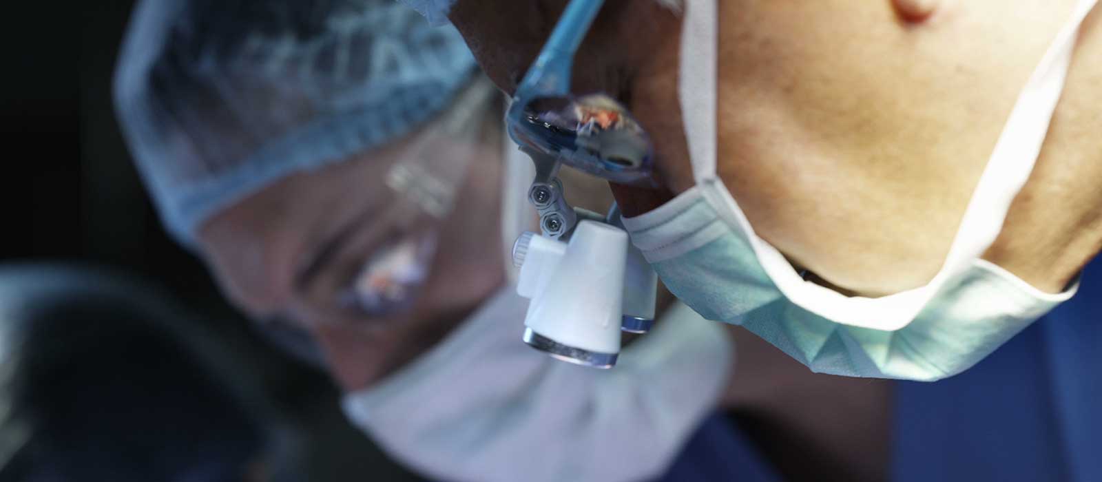 Close up of surgeons in operating room