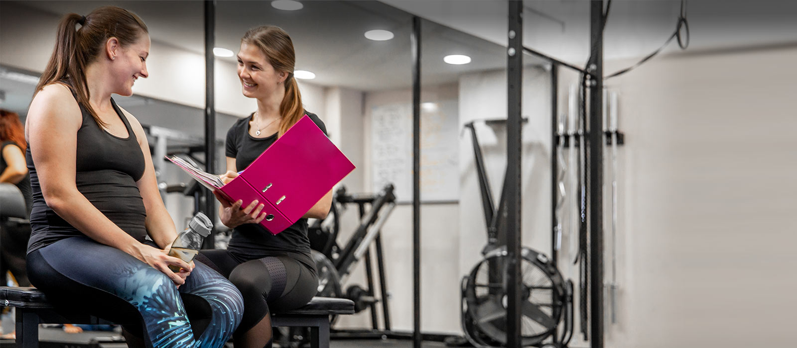 Female trainer with female client