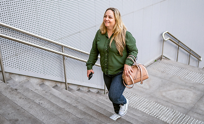 Woman walking up stairs