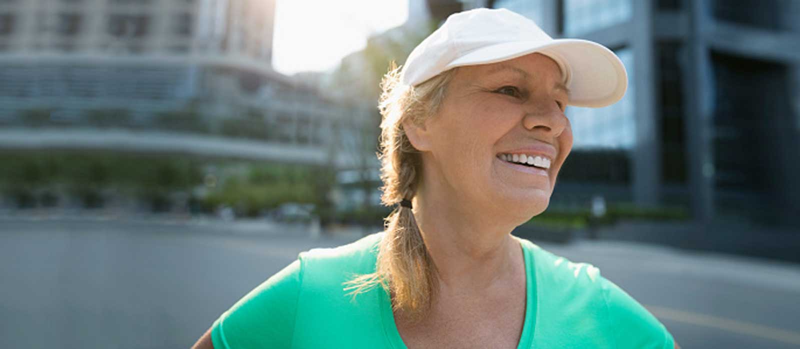 woman smiling in the sunshine