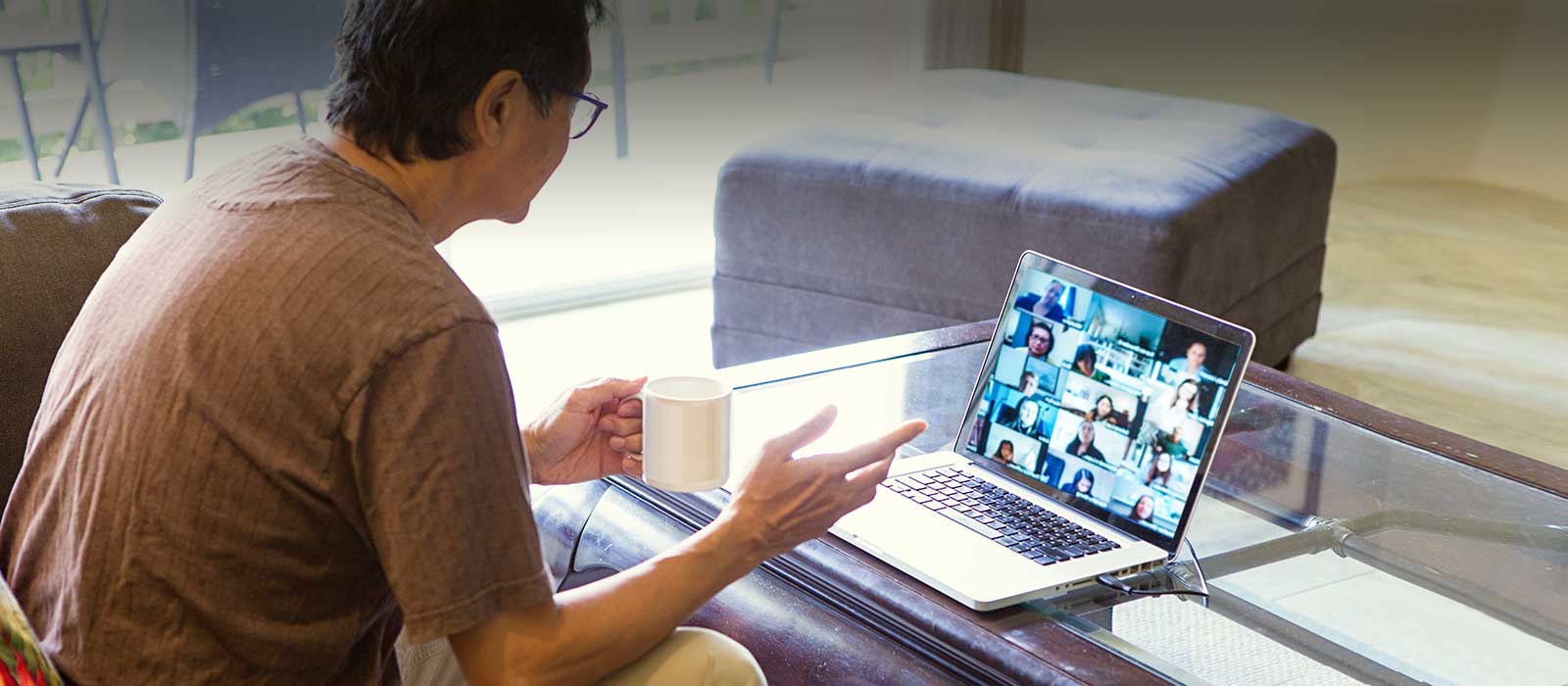 Mature man using virtual support group.