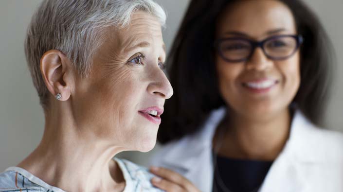 Breast cancer patient and doctor