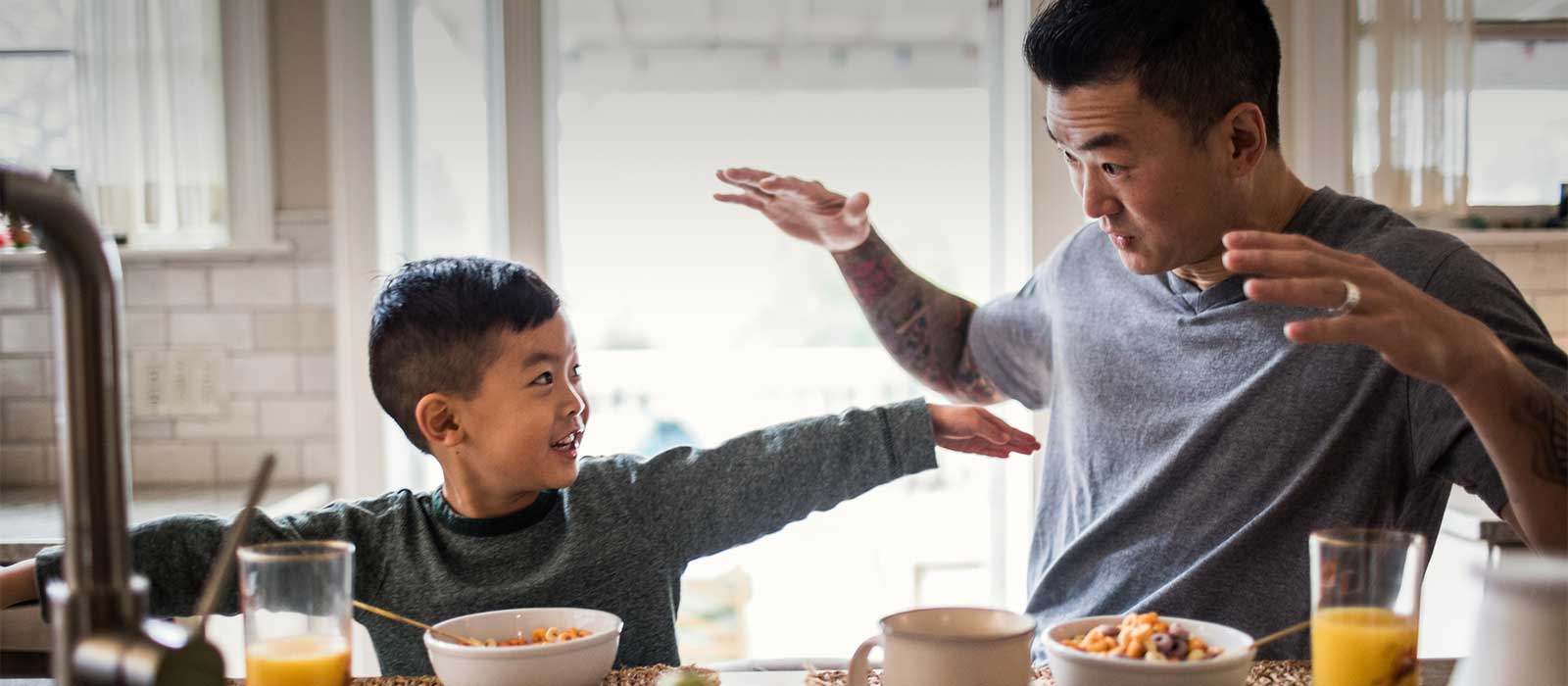 Father and son at breakfast 