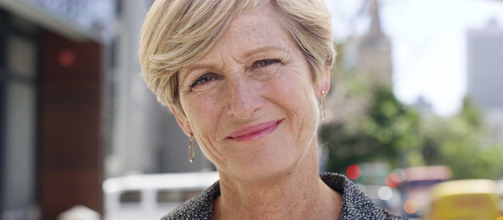 Close up of mature woman's face with freckles