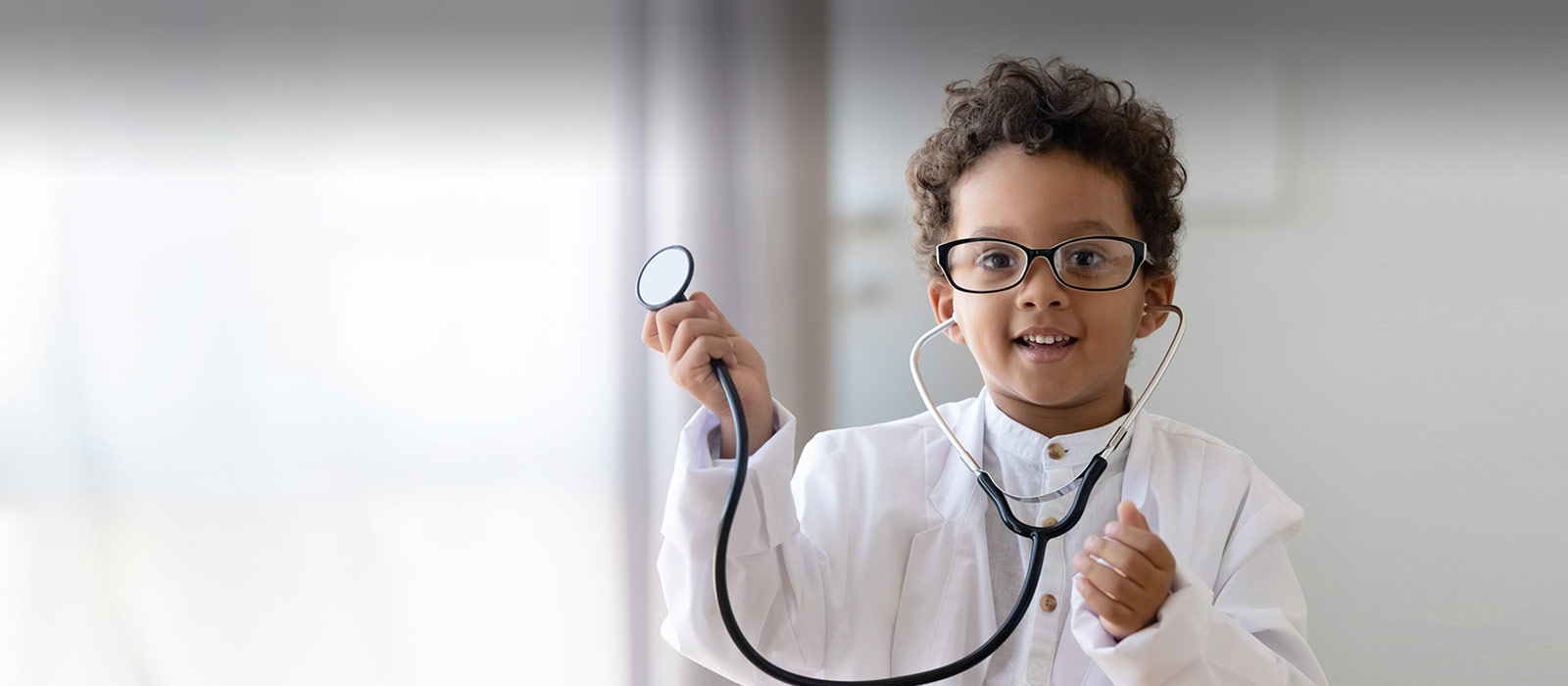 boy with stethescope