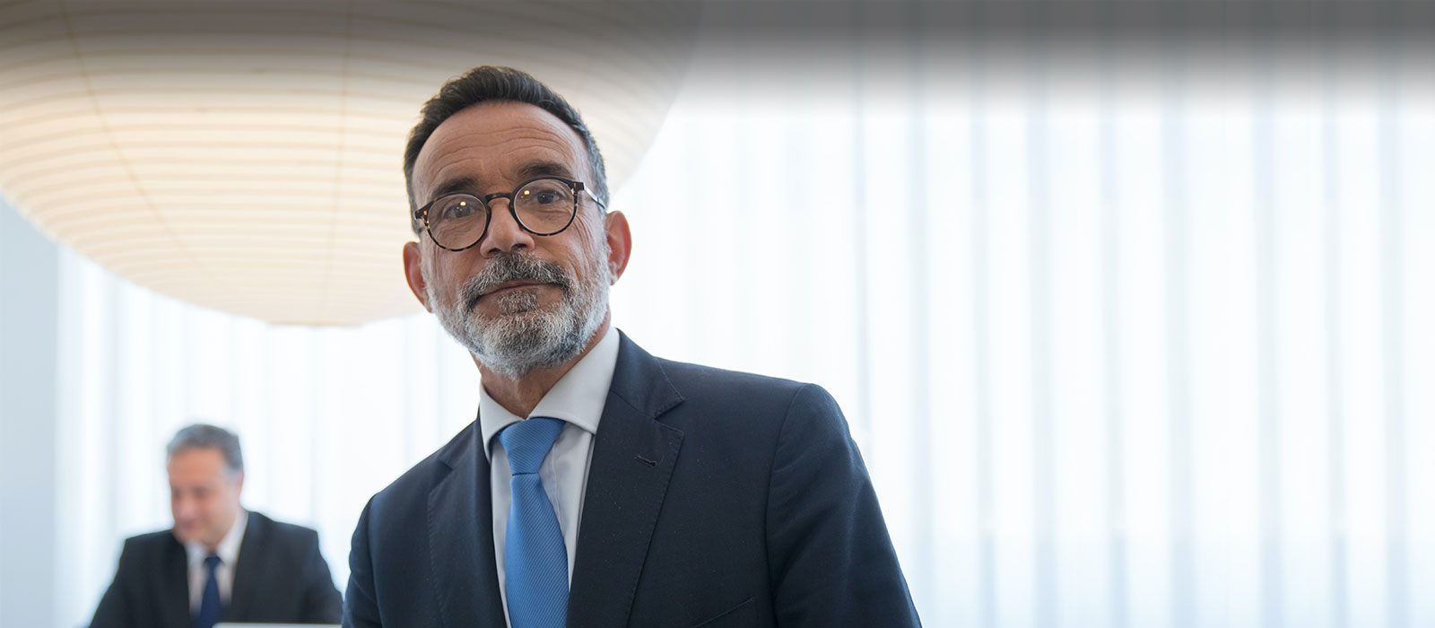 mature businessman in meeting room