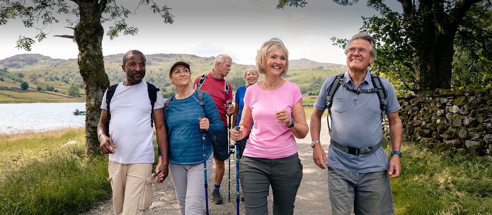 Group of senior couples walking on trail