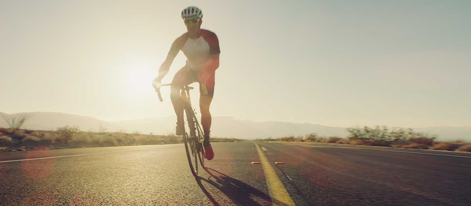 Cyclist on open road