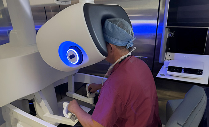 Surgeon performing micro surgery