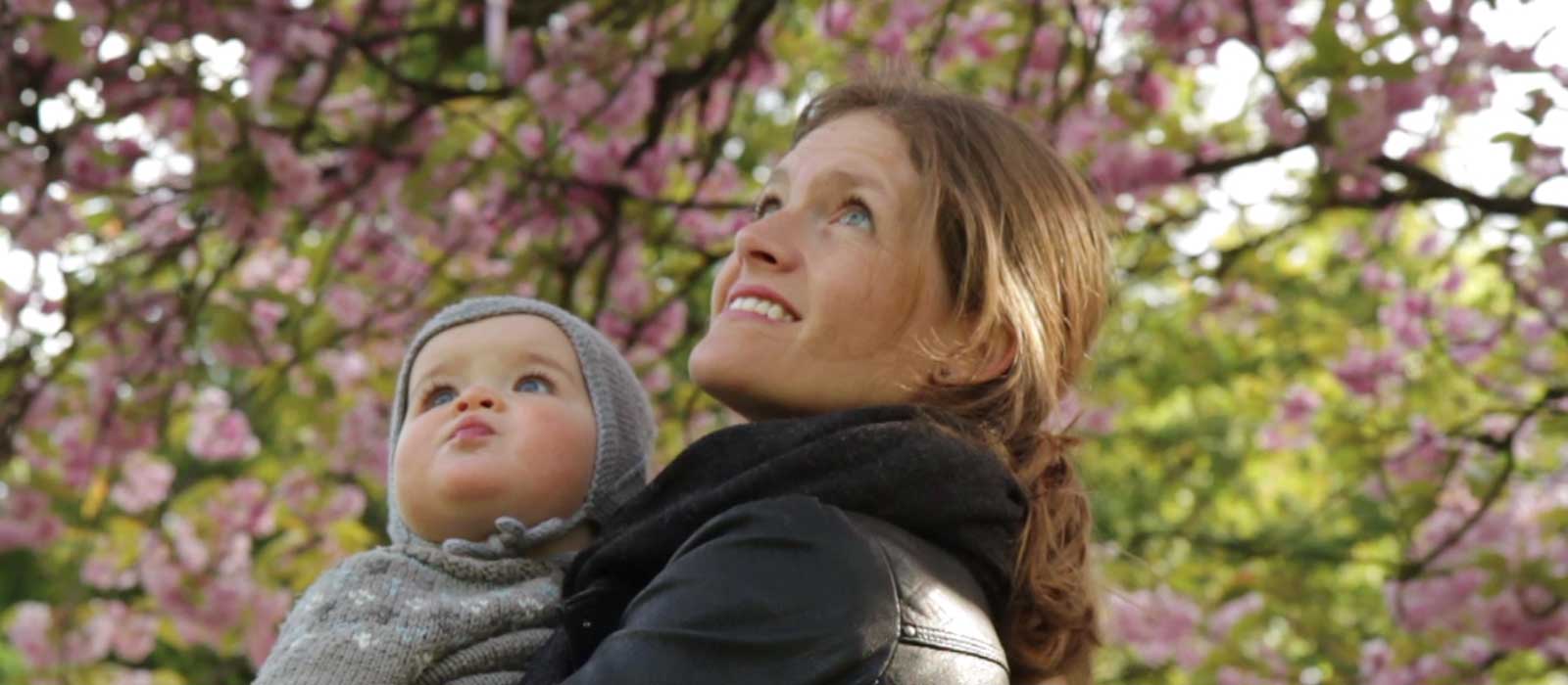 Mother and baby enjoying Cherry Blossom trees