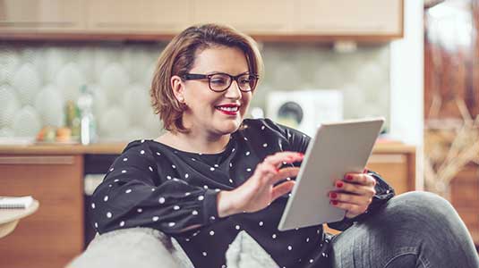 lady browsing on ipad