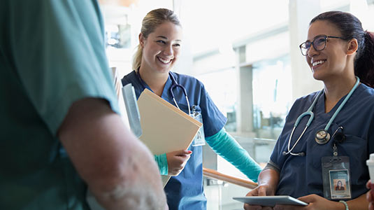 doctors and nurses in discussion