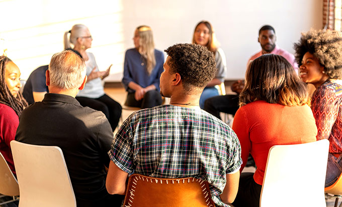 people talking in a support group 