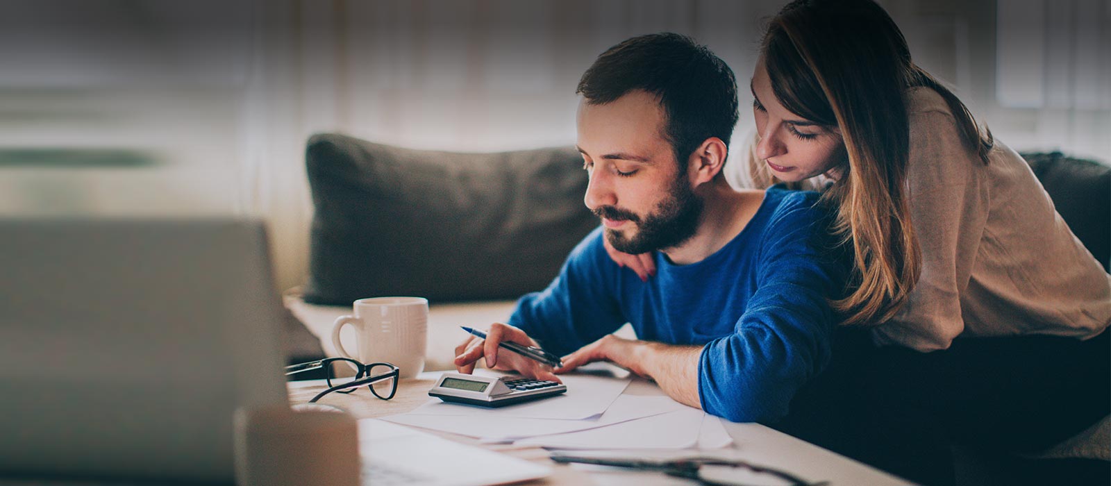 Couple review billing documents.