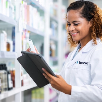 pharmacist checking stock