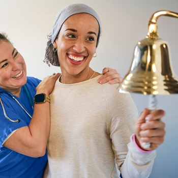 Female patient ringing bell with clinical team