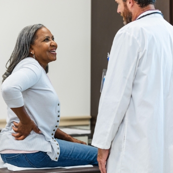 Mature female patient and doctor