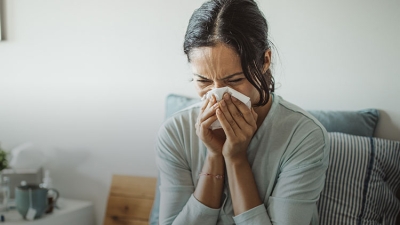 Woman with Flu symptoms