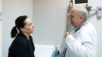 Doctor examining female patient