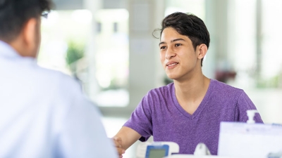 Teen boy conversation with surgeon