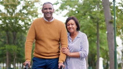Mature ethnic couple walking outdoors
