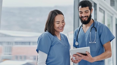 Happy male and female healthcare provider