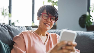 Middle aged female using smartphone