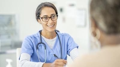 Female nurse consultation with patient