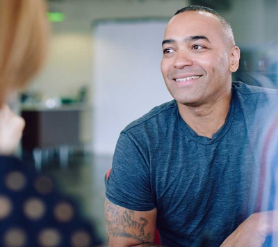 Man having positive interaction with counselor