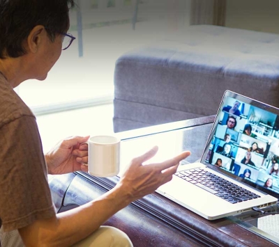 Mature man using virtual support group.