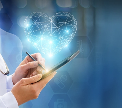 Doctor using tablet with heart illustration 