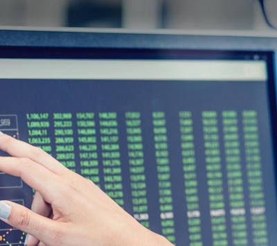 researcher reading data on screen