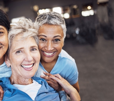 Three mature female gym friends 