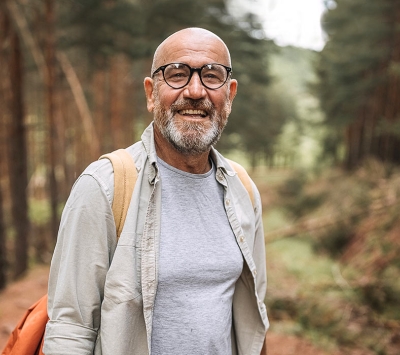 Mature man walking outdoor trails