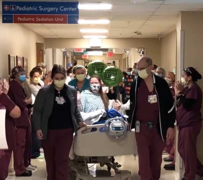 kidney transplant staff celebrating patient discharge