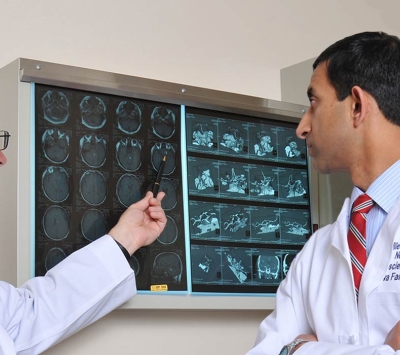 Neurosurgery team reviewing scans