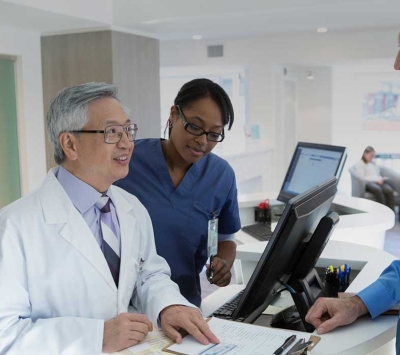 patient checking out with doctor