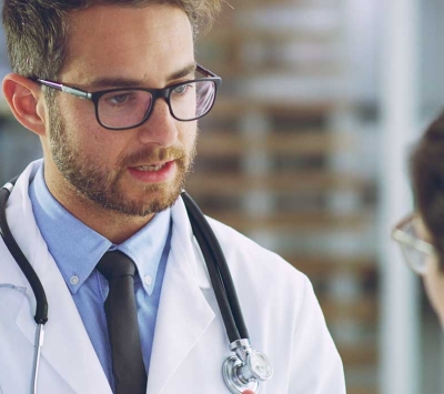 Primary care doctor and patient