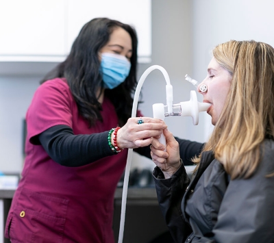 provider administering a test to a patient