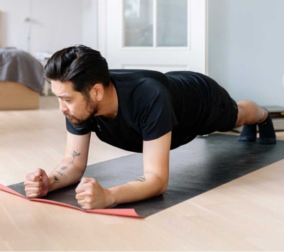 Man exercising at home 