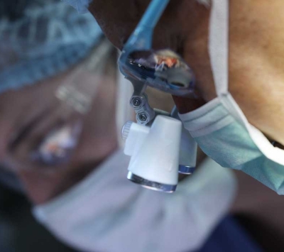 Close up of surgeons in operating room