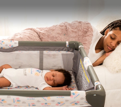 New mother and infant sleeping 