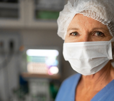 Nurse in operating room with mask on