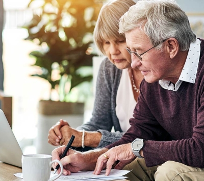 Senior couple reviewing documents