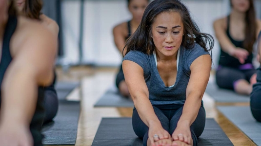 women stretching in a fitness class