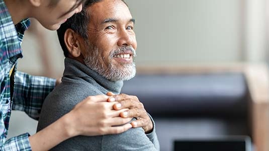 Comforting hand on shoulder