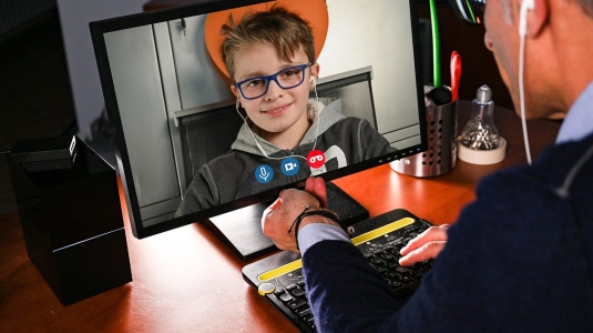 kid talking to doctor on video screen