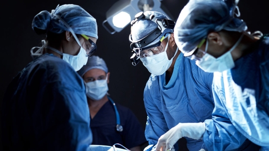 Surgeons operating