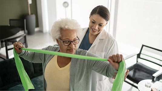 Senior rehab patient with a specialist